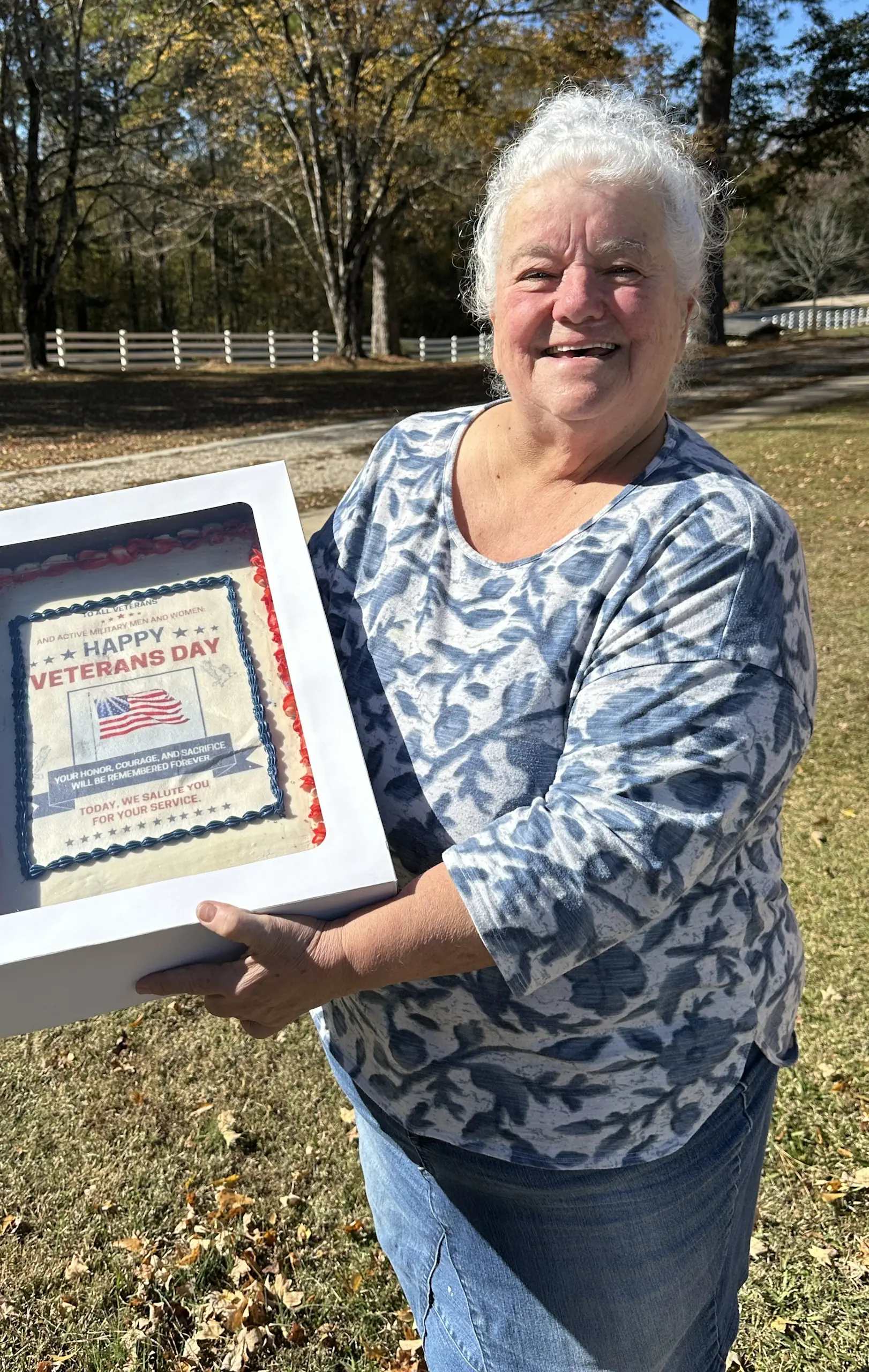 Maureen Gay’s homemade cake was a delicious hit at the Whispering Hills Veterans Day event